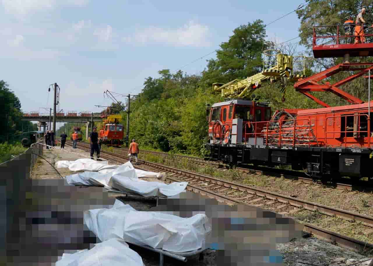Russian attack kills 8 at Kyiv commuter train station