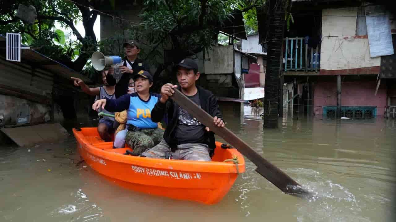 Philippines floods, landslides kill at least 12, 8 missing