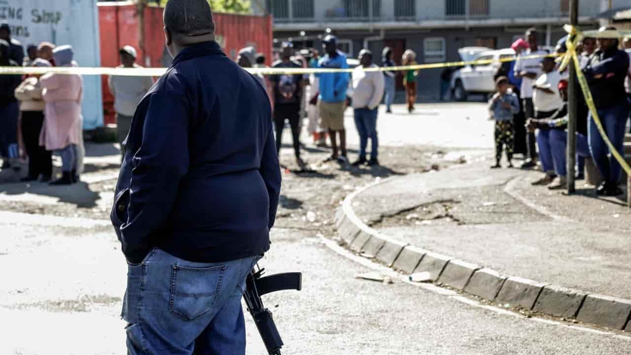 South African police probe mining feud shooting, 27 dead as elections near