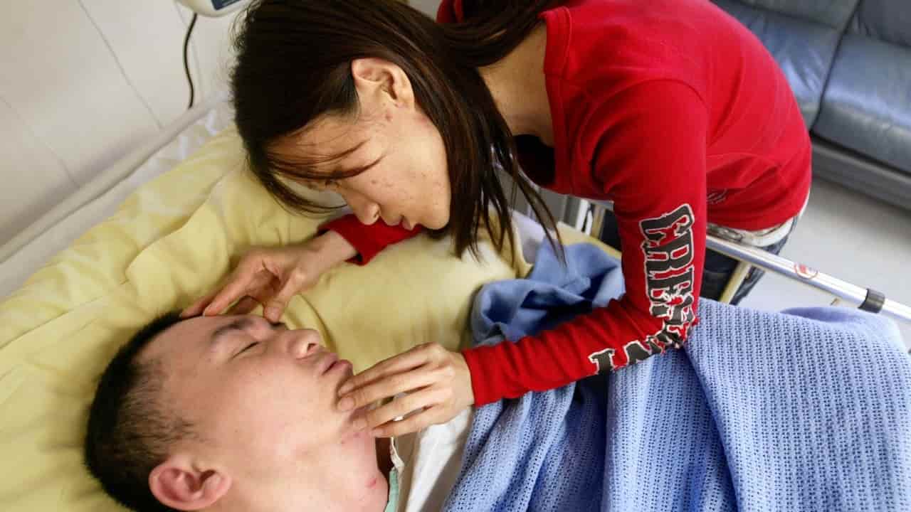 Hong Kong police constable paralyzed for 21 years to receive highest honors funeral