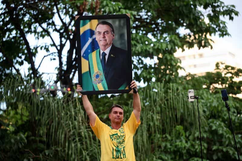 Flavio Bolsonaro runs for Brazil president, testing father's legacy