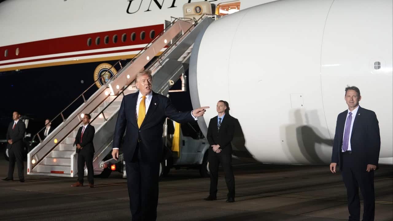 Trump says he switched planes due to possible Iranian threat