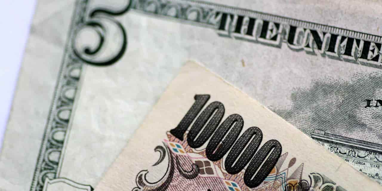 Yen poised for gains on US midterms, French unrest