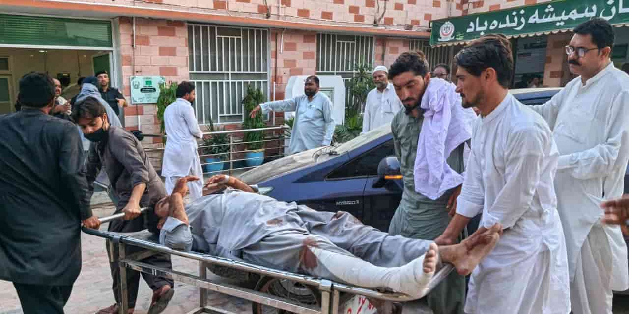 Gunmen target ambulance in Pakistan after suicide bombing killed 12