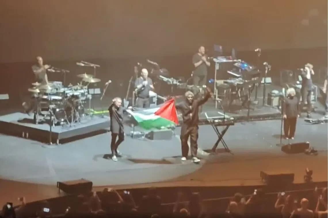 Massive Attack members banned from Singapore over Palestinian flag display