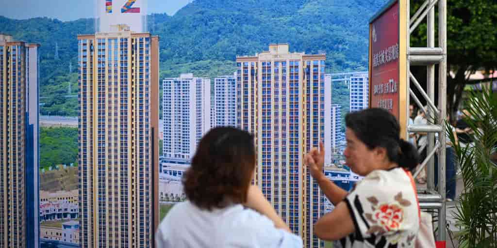 China tightens property developer rules