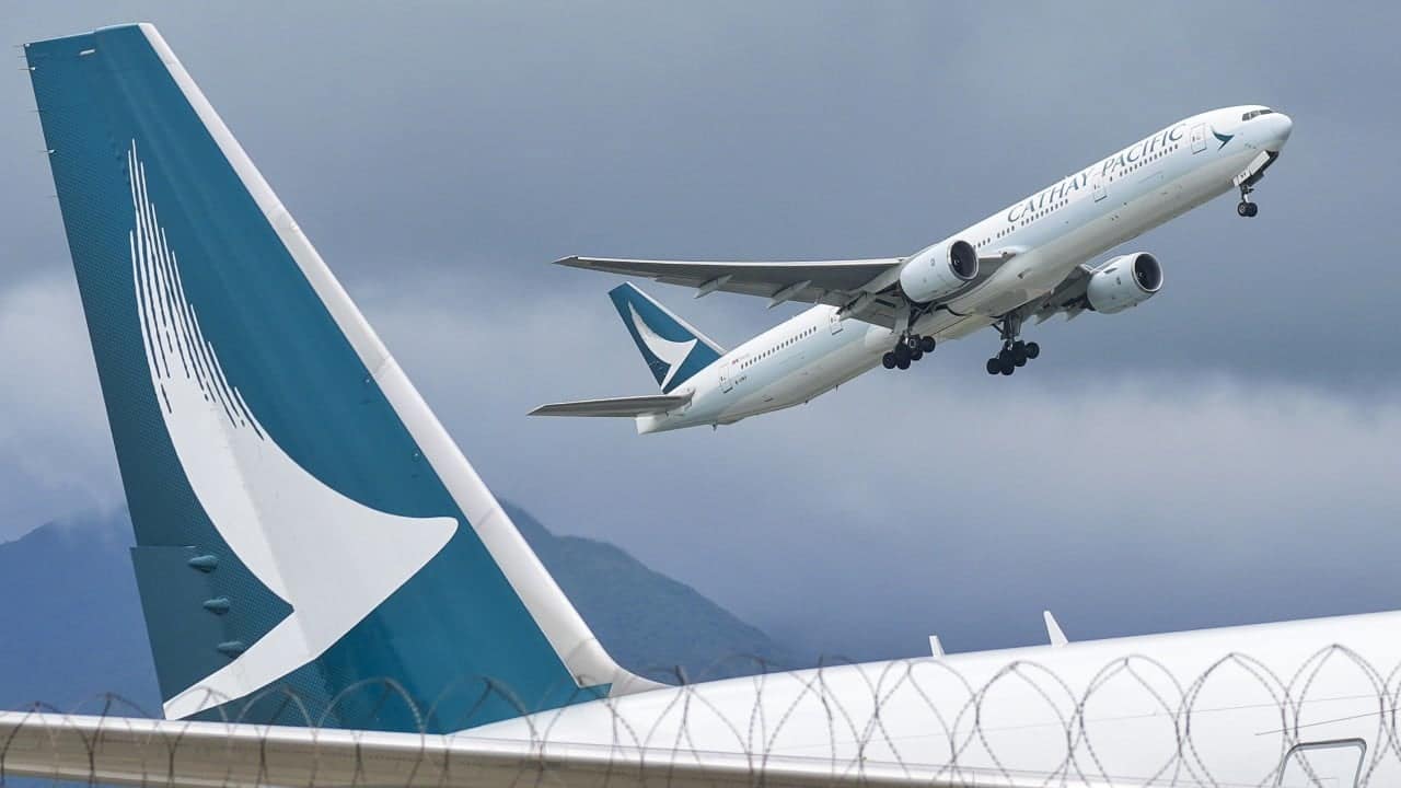 Hong Kong finance chief urges Cathay Pacific to keep fares attractive, add routes