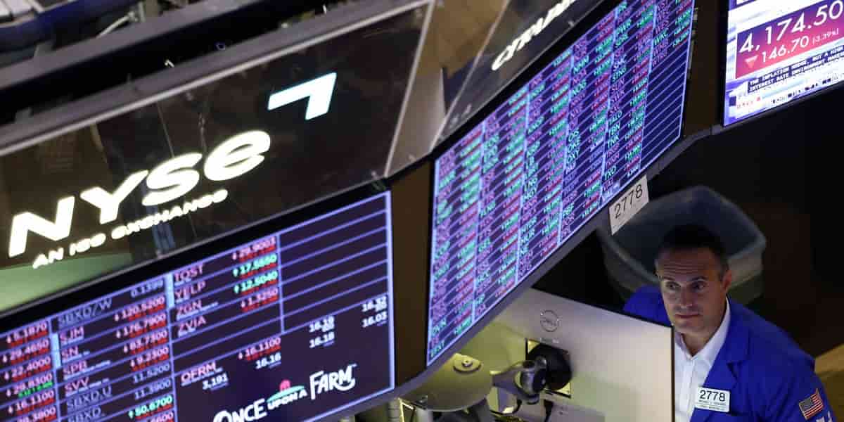 Stocks fall as oil prices surge and bond yields hit 24-year highs