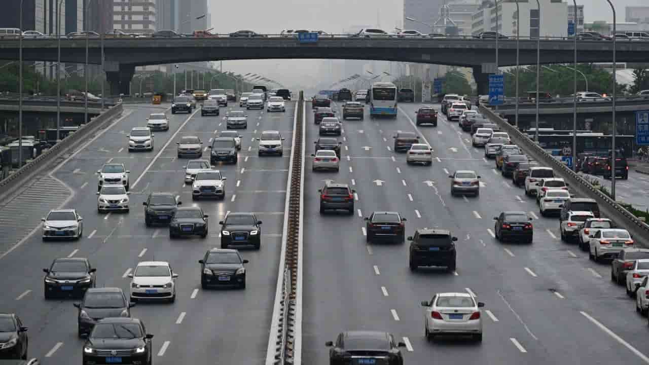 China's EV Boom Faces Overcapacity, Price Wars, and Rising Road Costs