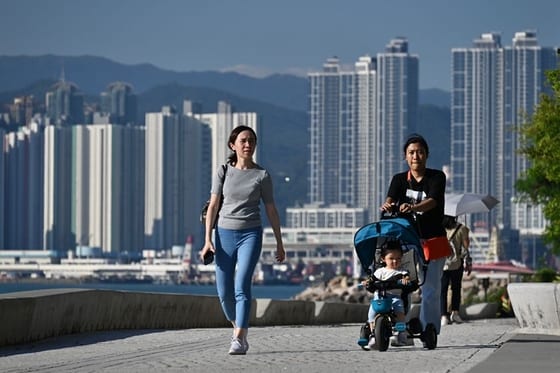 Hong Kong offers larger cash bonuses, tax breaks to boost birth rate