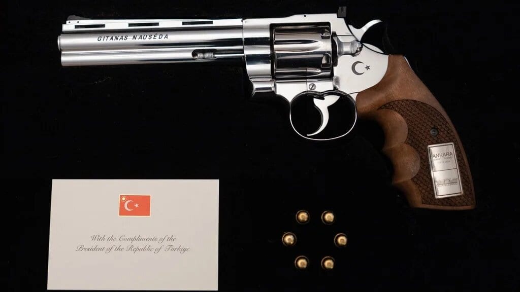 Erdogan gifts Trump gold-plated revolver at Nato summit