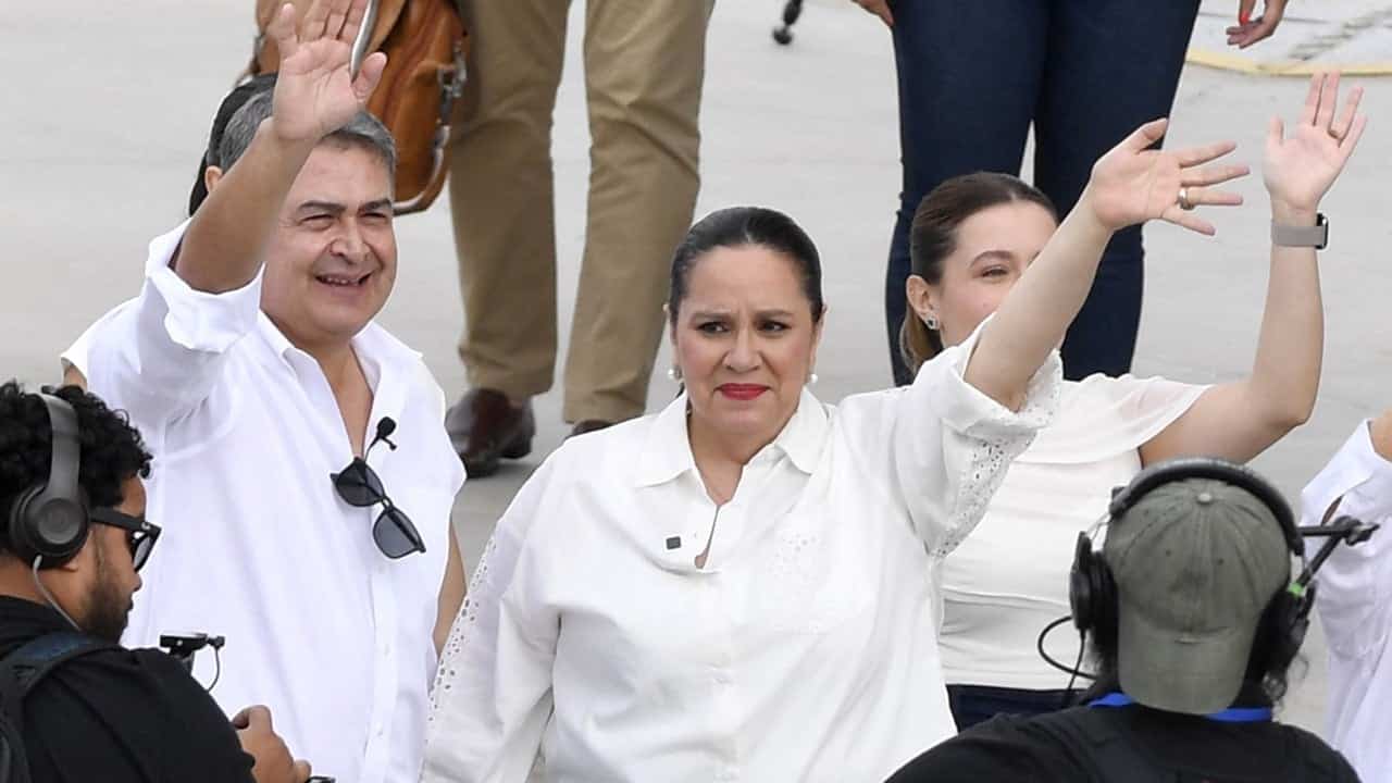 Honduras ex-President Hernandez returns home after US pardon