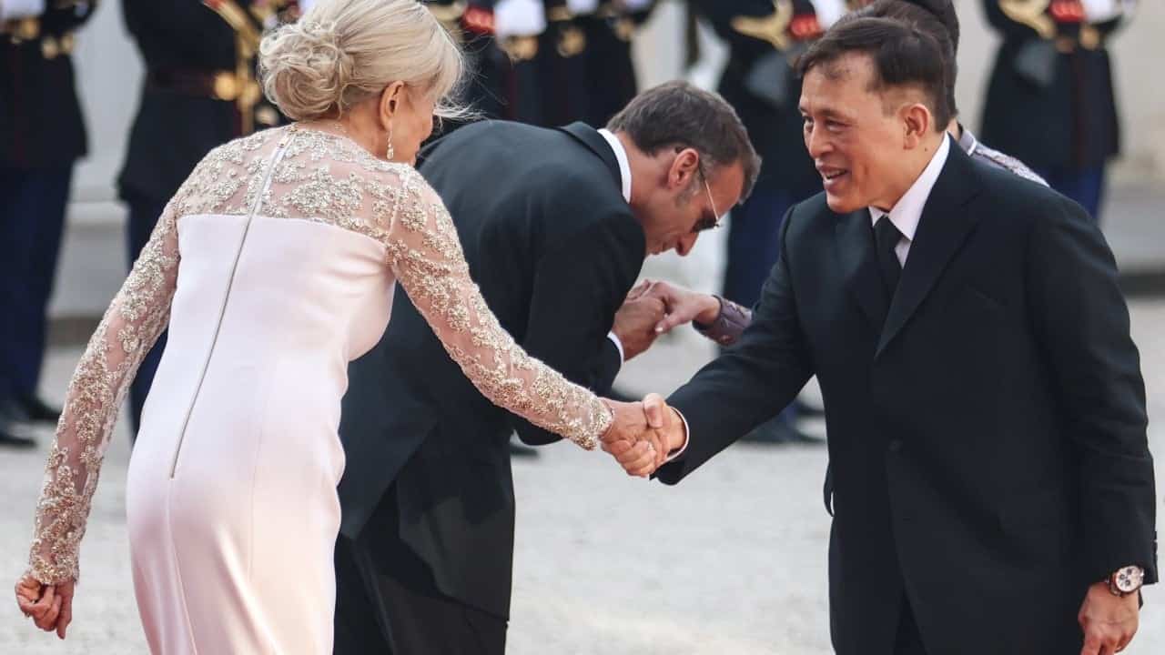 Thailand says Macron kneeling photo is AI-generated