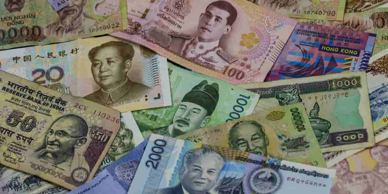 Asian currencies slide on AI and oil price worries