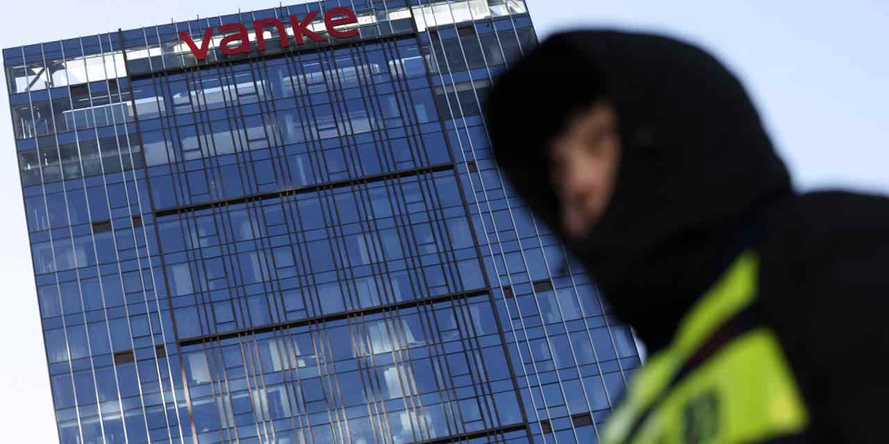 Vanke's first-half loss widens to 12 billion yuan amid property crisis