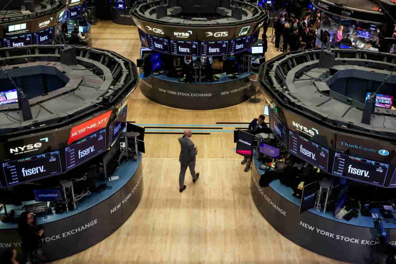 Wall St higher on cool inflation, strong earnings; PayPal surges