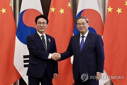 South Korean PM calls for elevated exchanges with China's premier