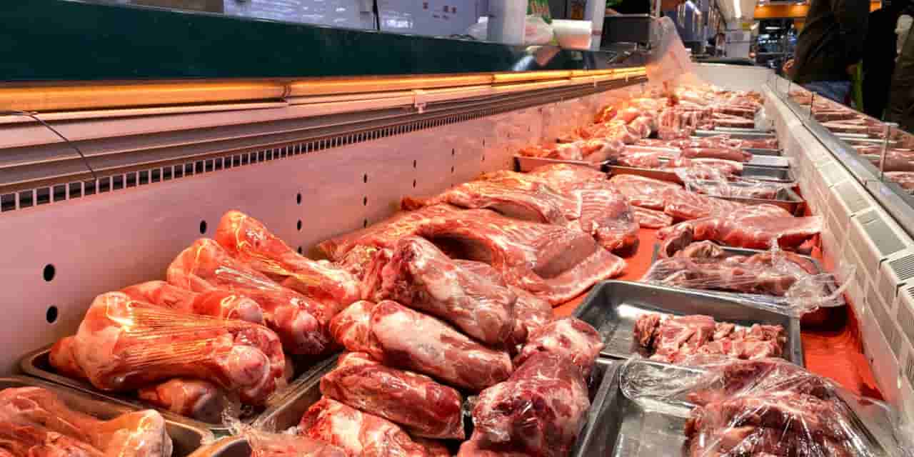 China's high-rise pig farms lead to pork glut, falling prices
