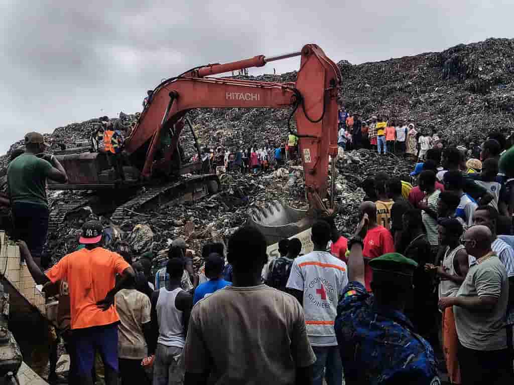 Landslide kills 30 after waste mound collapses at Guinea landfill