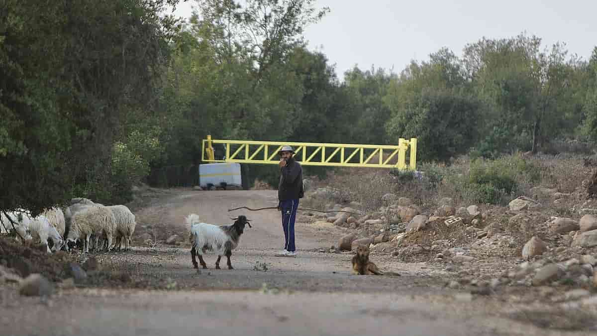 Israel raids Syrian village, installs military checkpoint