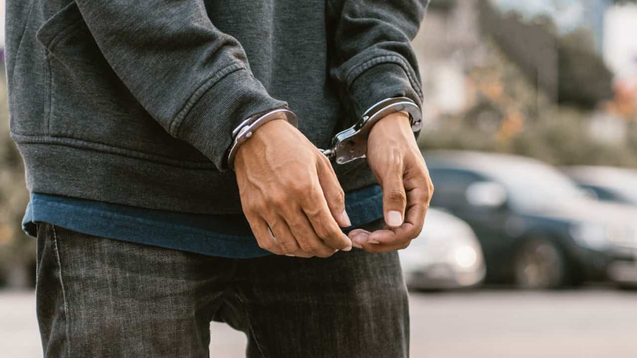 China arrests 52 Singaporeans in pyramid scheme crackdown