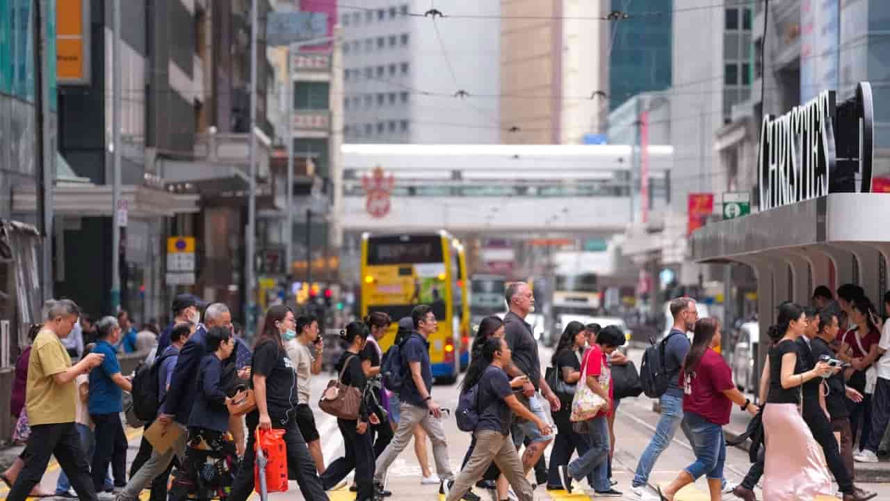 Hong Kong pay growth slows as Guangdong accelerates, survey finds