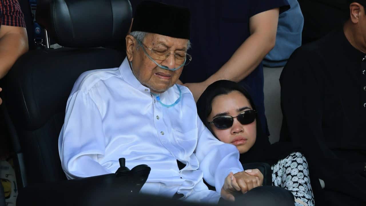 Siti Hasmah, wife of former Malaysian PM Mahathir, dies at 100
