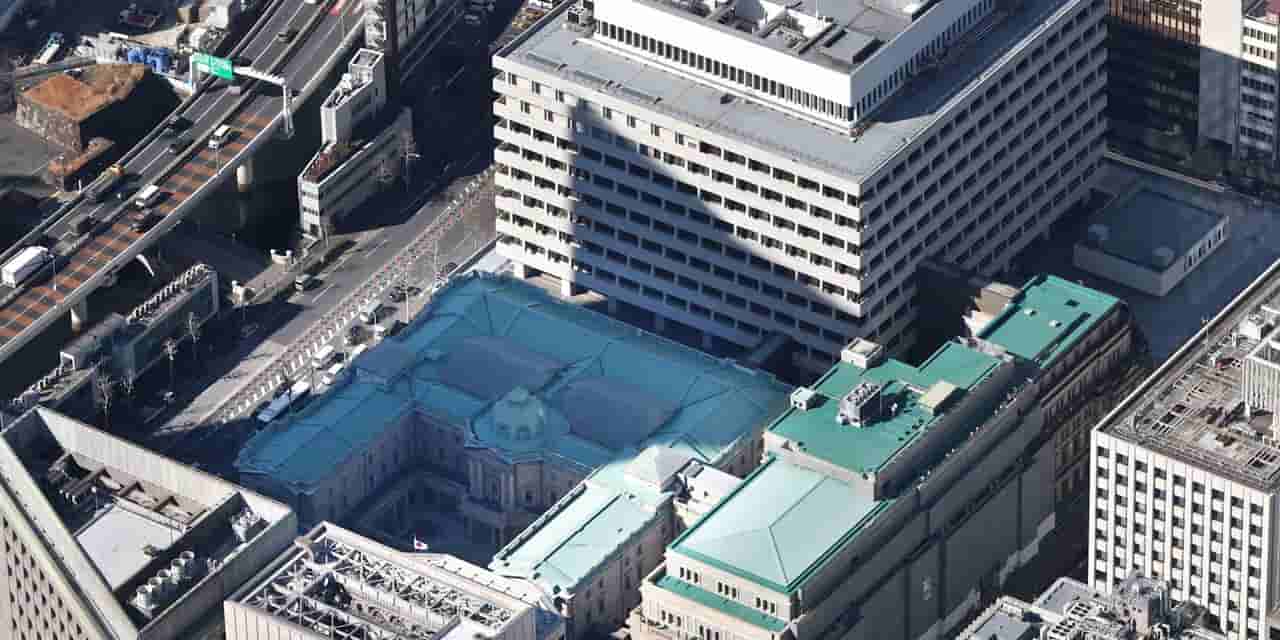 Bank of Japan Holds Rates Steady, Lowers Inflation Forecast