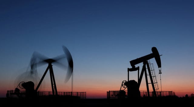 Oil drops from near six-month highs on easing Iran tensions