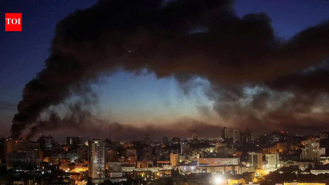 Russia attacks Kyiv with missiles, damaging homes and a petrol station