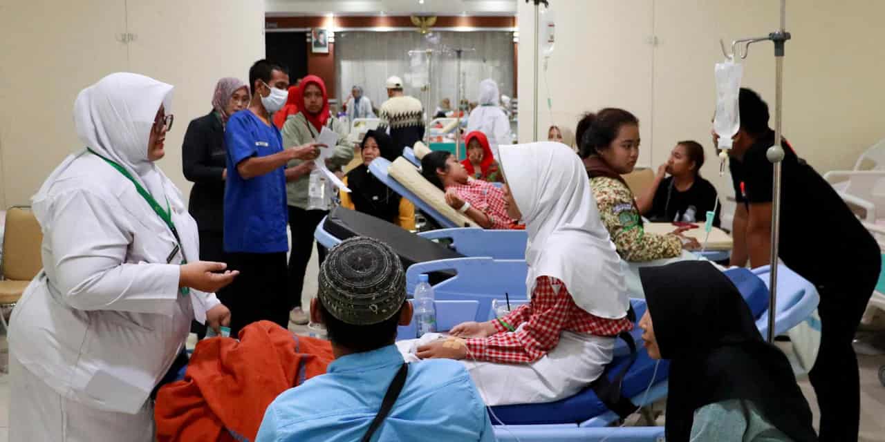 Indonesian parents file police complaint over sickened children from free school meals