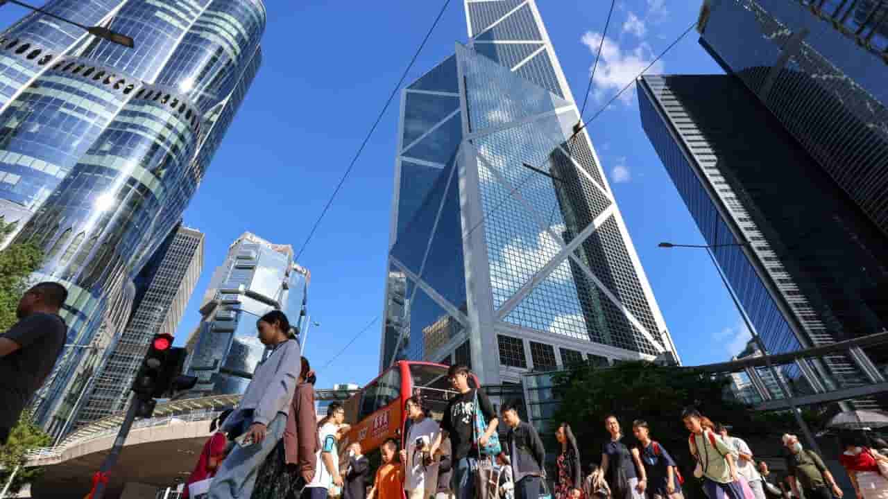 Hong Kong minister says rigid five-year plan goals avoided planned economy fears