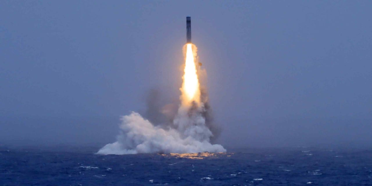 Japan seeks stronger deterrence after China submarine missile launch