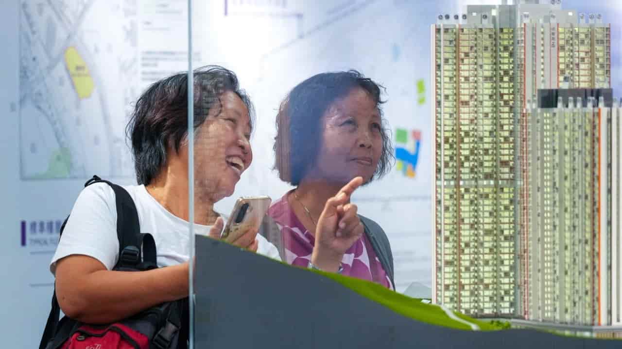 Hong Kong fire victims choose replacement flats after estate buy-back