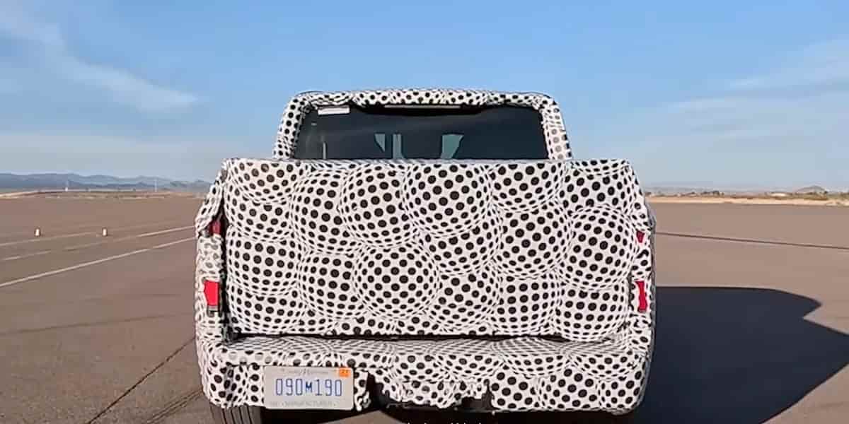 Ford's $30,000 EV truck camouflage doubles as an advertisement