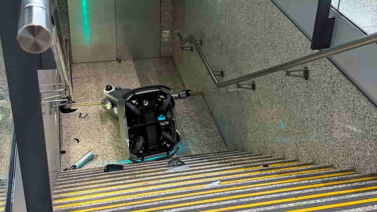 Patrolling robot damaged after falling down staircase at Hong Kong airport