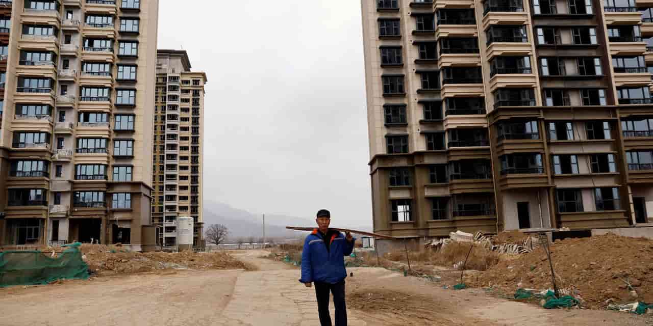 China to reform home sales system to curb delivery risks