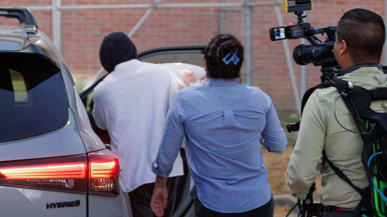 ICE officer charged with lying in shooting of Venezuelan man