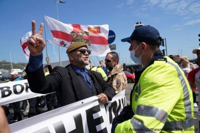 Masked protesters block traffic at Port of Dover in anti-immigration demonstration