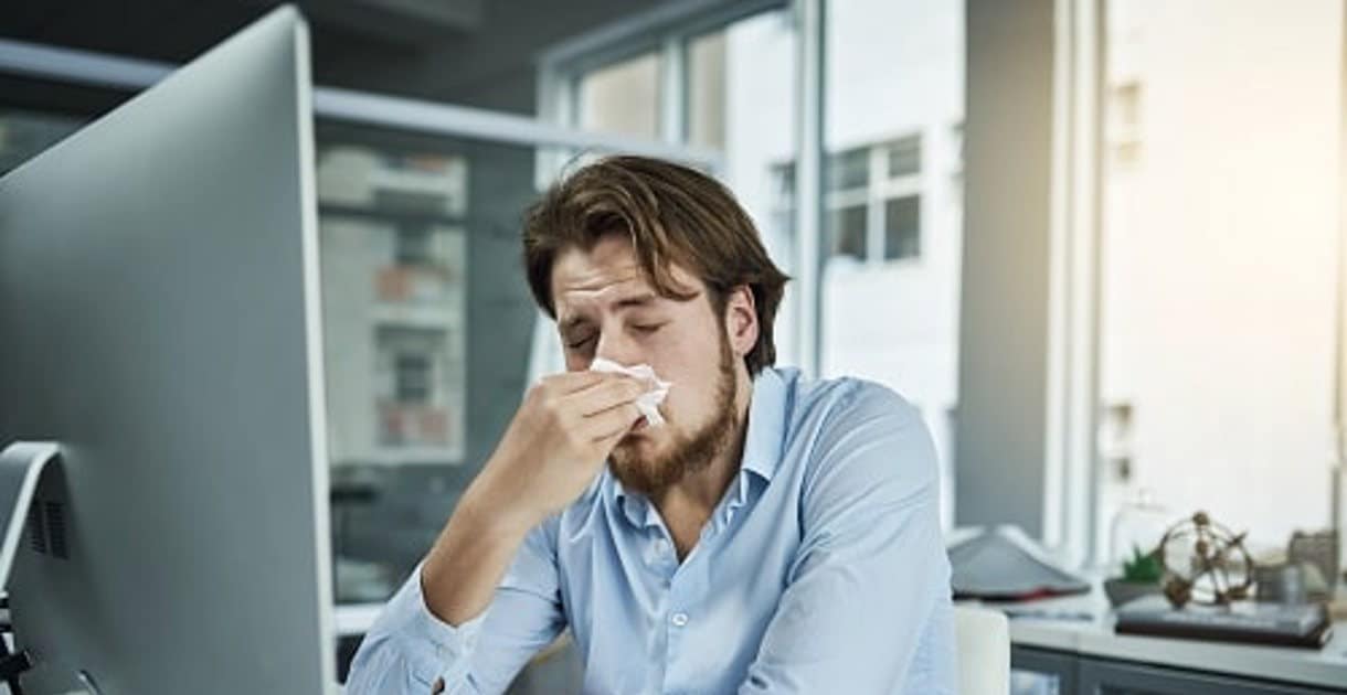 UK worker sickness costs economy billions annually