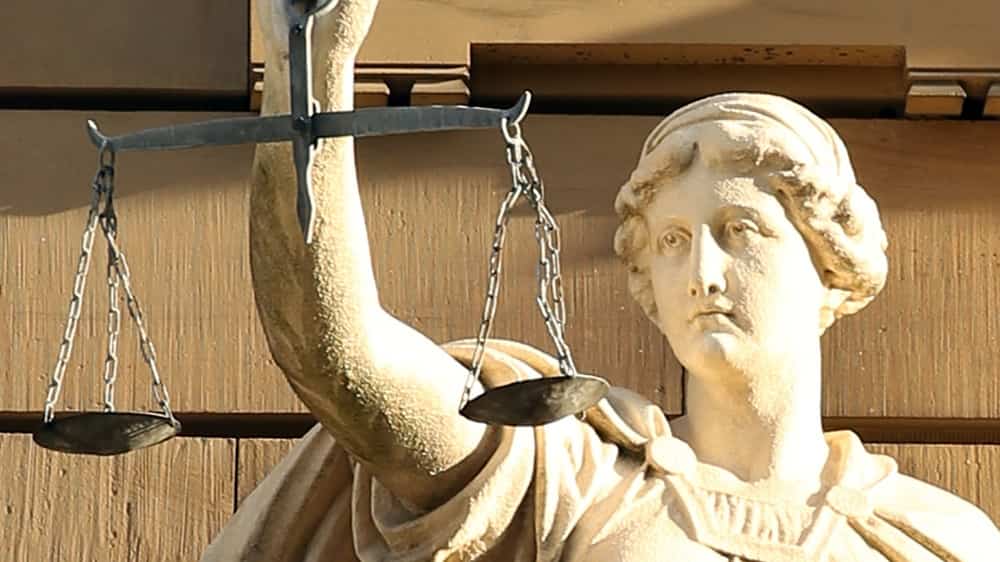 UK justice secretary's plan to cut jury trials faces criticism