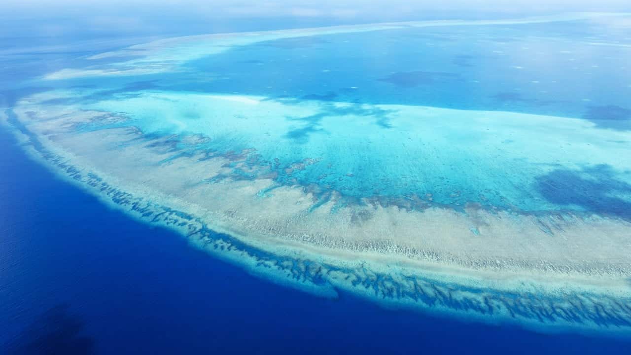 China completes initial construction phase at disputed South China Sea reef
