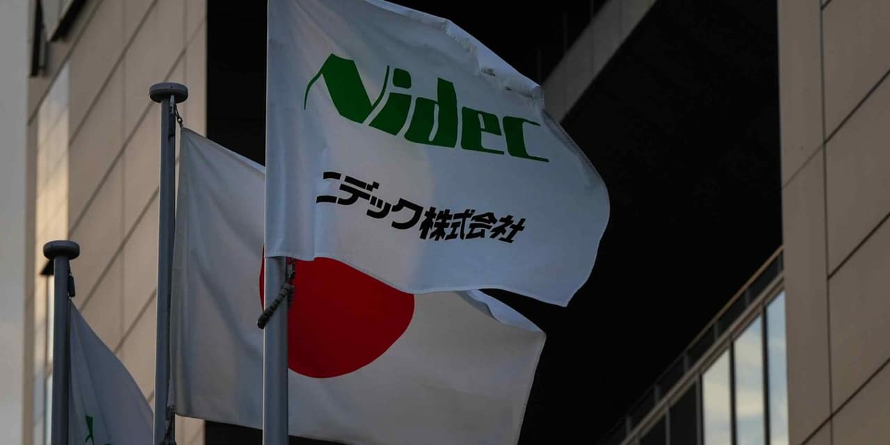 Japan's family firms lag as corporate reforms boost dealmaking