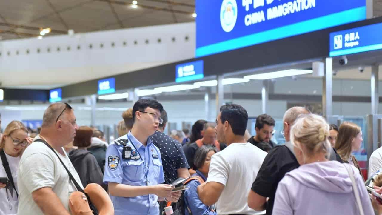 China allows foreigners to skip police stations, register stay online