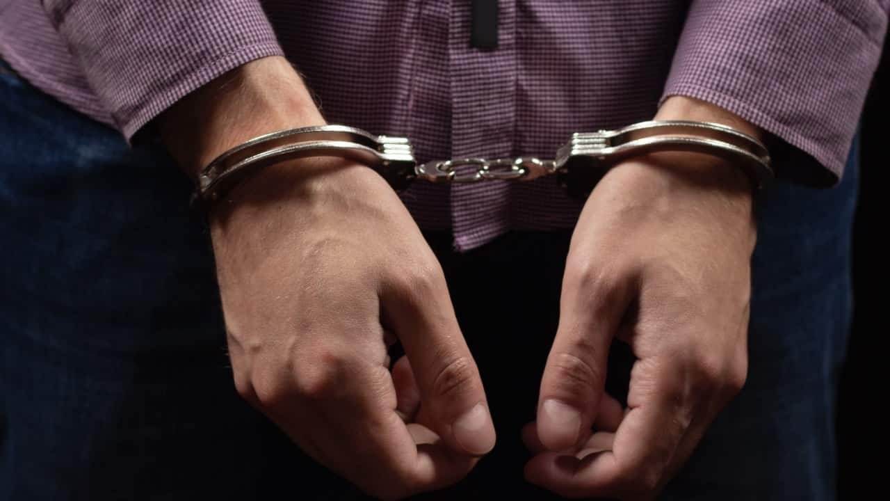 China reveals executive spied for two countries