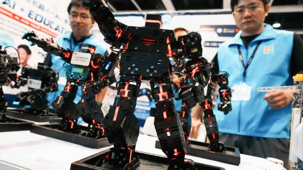 Paul Chan urges AI adoption for competitiveness at tech festival