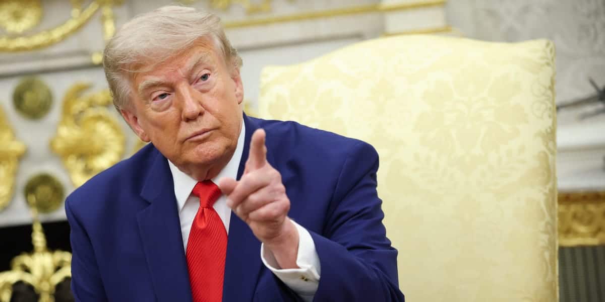 Trump puts name on government buildings, passes, ships