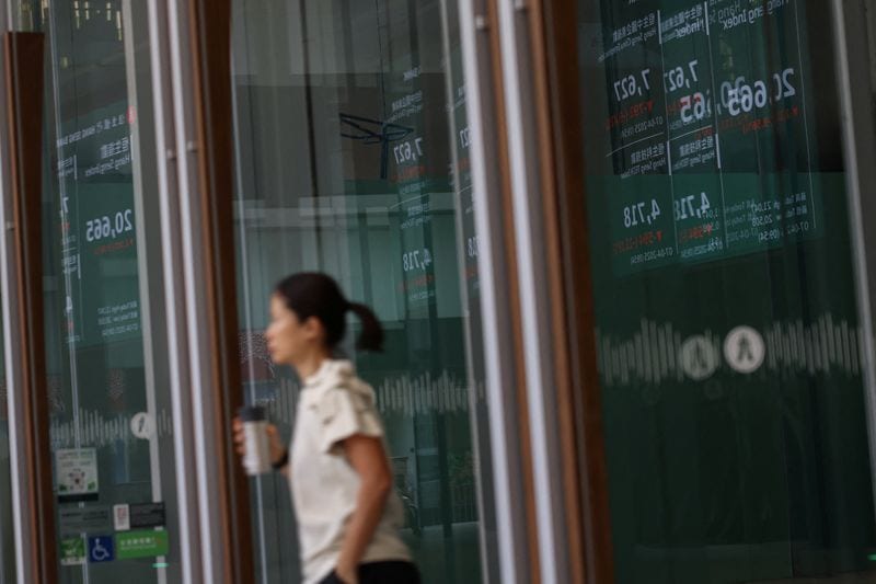 Asian shares fall on chipmaker drag, bonds cheer cooler inflation