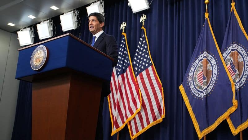 Fed hikes rates to fight inflation, Wall Street gyrates