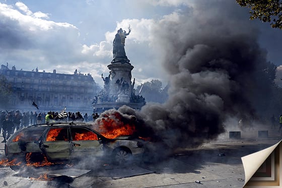 France's town hall burns as protests turn violent